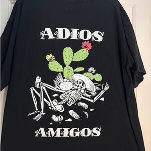 LuLaRoe Black Tee with Cactus and Skeleton Design